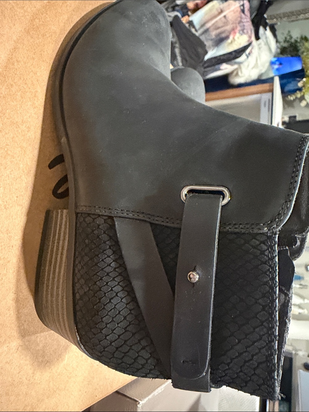 Clarks Black Ankle Boot with Textured Side Panel and Strap Accent